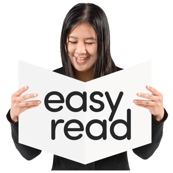 Lady holding a sign that says Easy Read